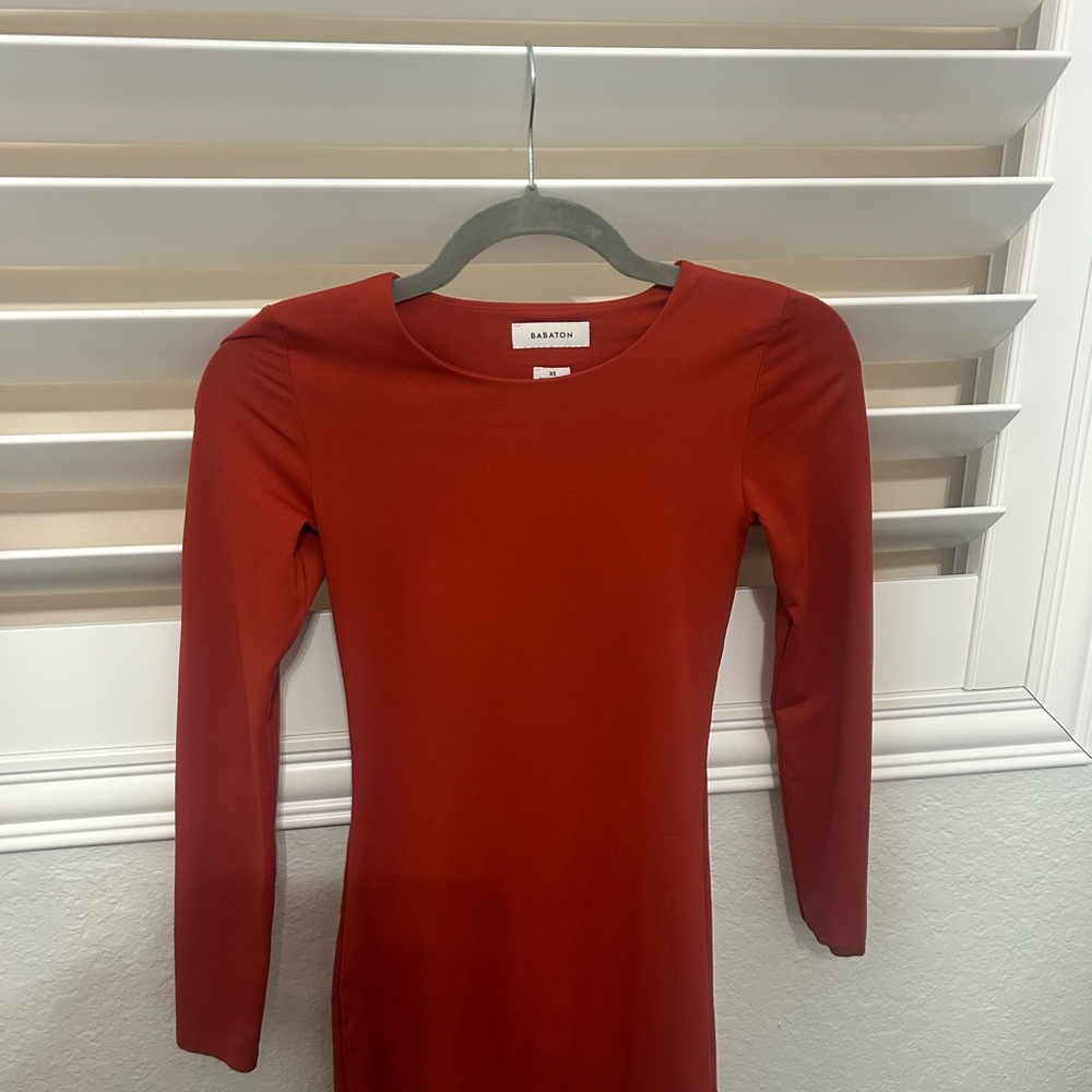 Aritzia Babaton Contour Crew Longsleeve Mini Dress in a burnt orange